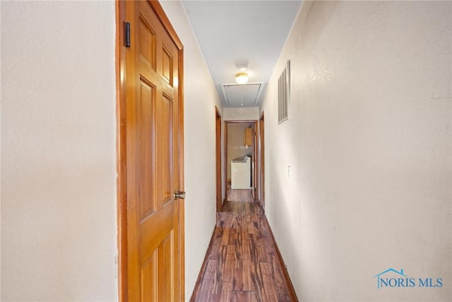 hallway with wood-type flooring