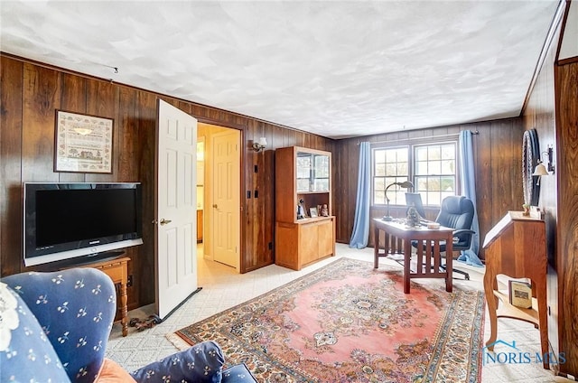 living room with wood walls