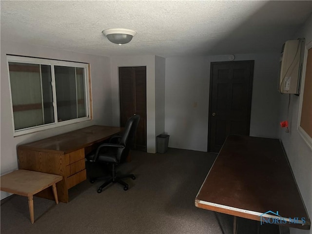 office area featuring a textured ceiling