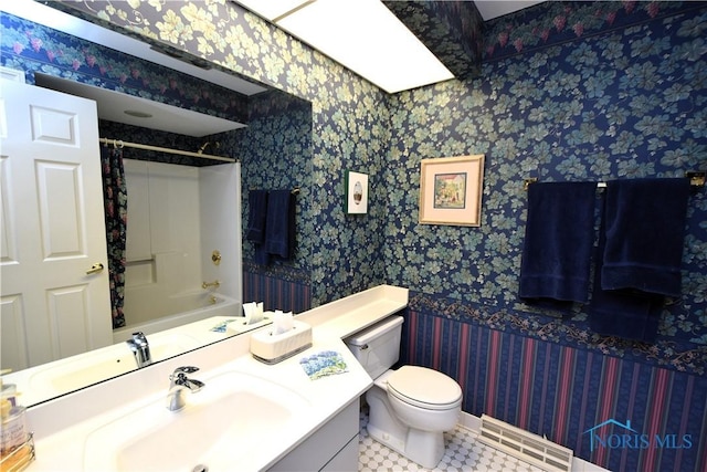 full bathroom with tile patterned flooring, vanity, shower / bath combo, and toilet