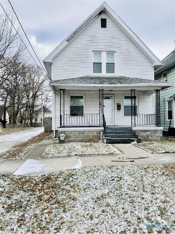 915 Nesslewood Ave, Toledo, OH 43610 - view of front of house featuring a porch and roof with shingles