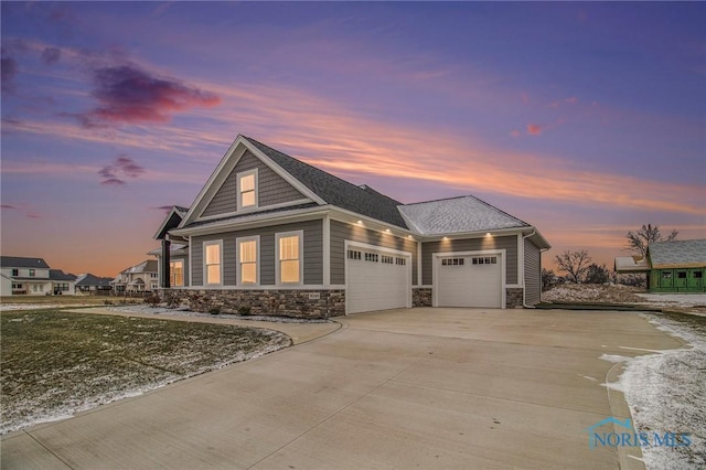 view of front of property with a garage