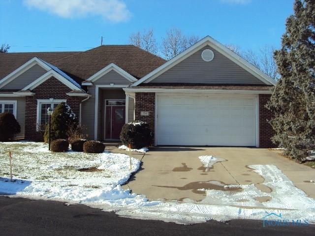 ranch-style home with a garage