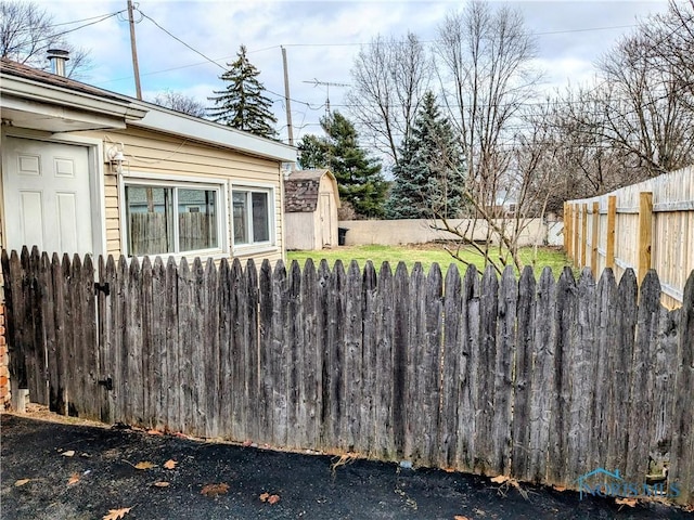 exterior space with a shed