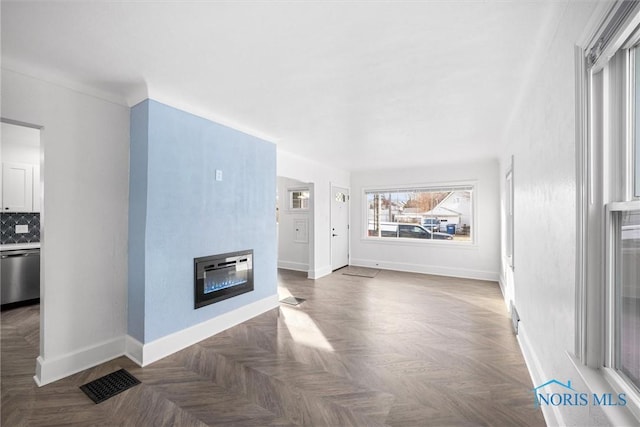 living room with dark parquet floors