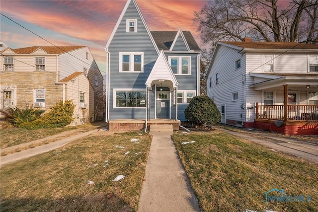 view of front of home with a yard