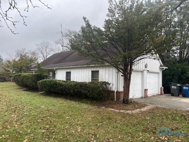 view of home's exterior featuring a yard