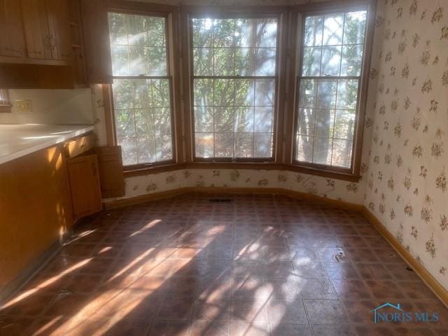 view of unfurnished dining area