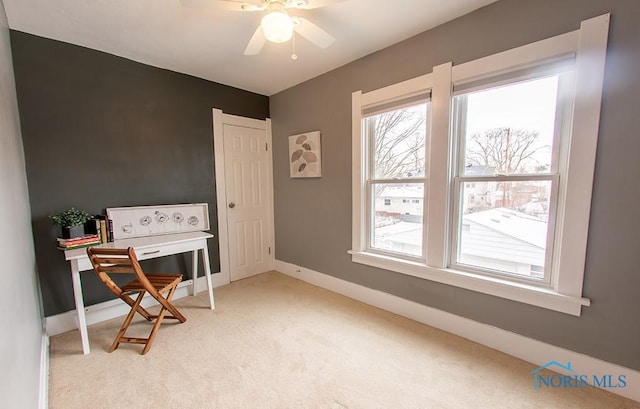 misc room with ceiling fan and light carpet