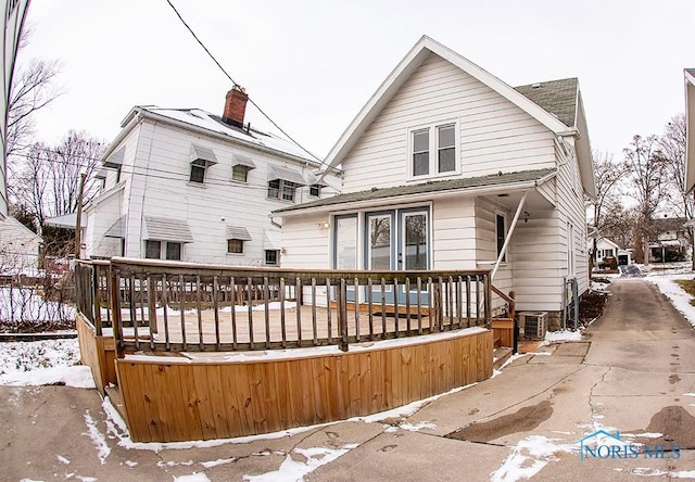 view of snow covered property