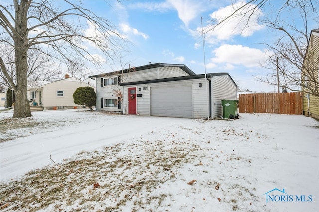 view of front of house with a garage