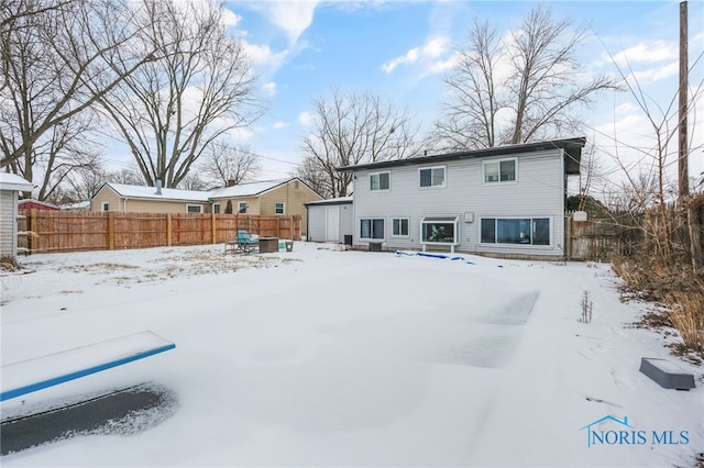 view of snow covered property