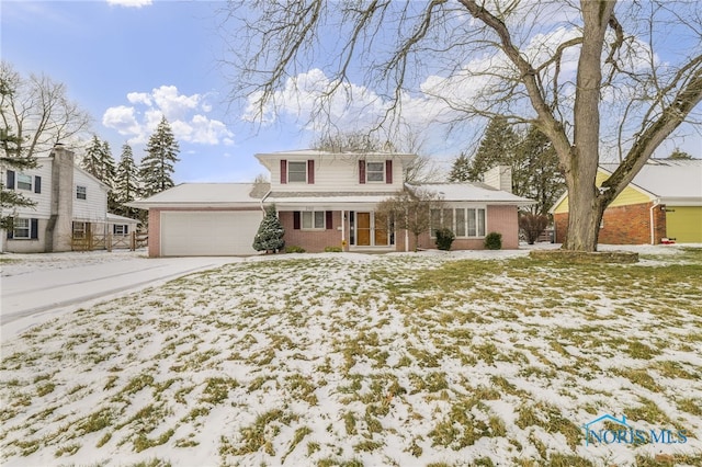 front of property with a garage