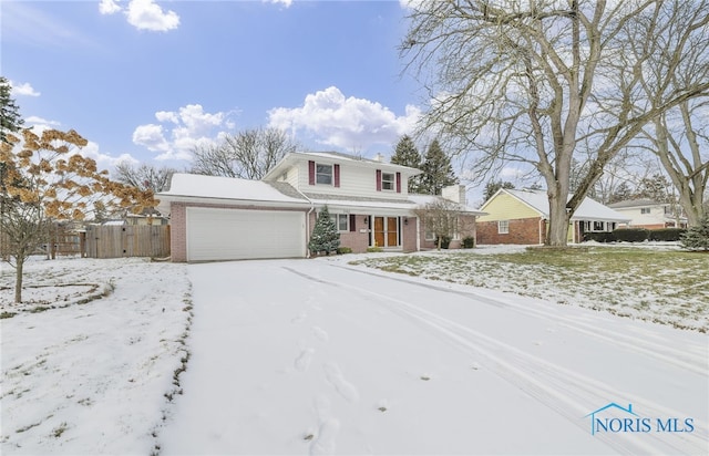 front of property featuring a garage