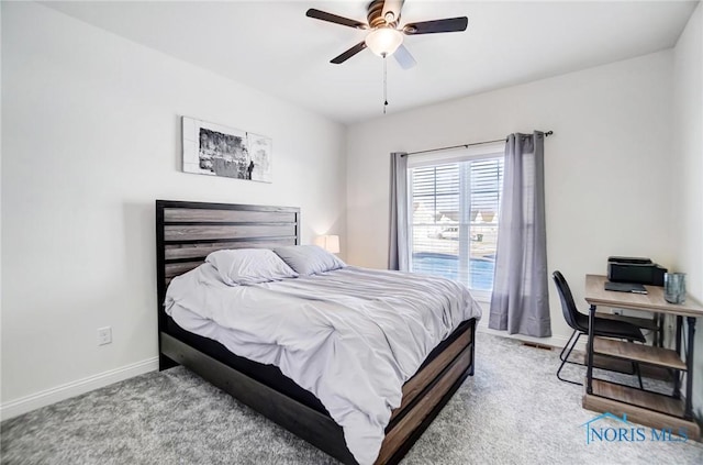 bedroom featuring ceiling fan and light carpet