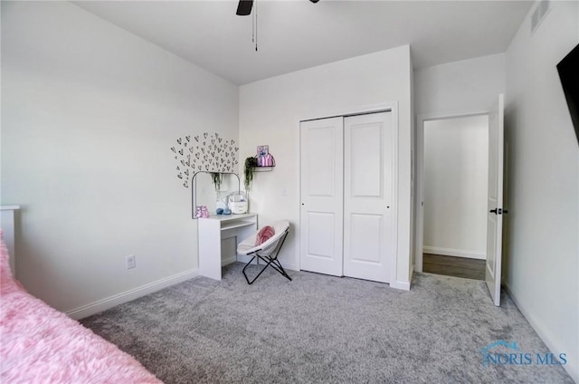 bedroom with carpet, a closet, and ceiling fan