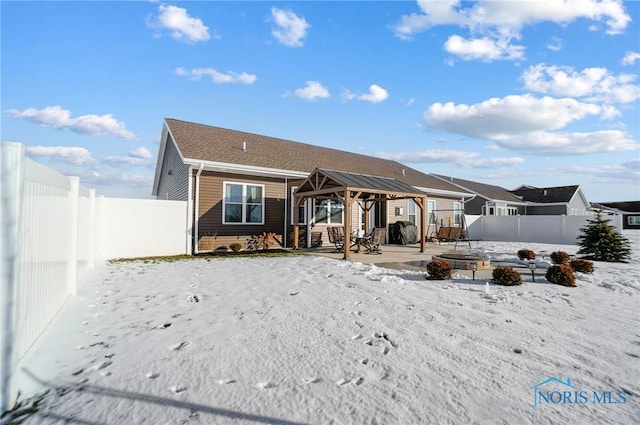 view of front of home featuring a gazebo and a patio area