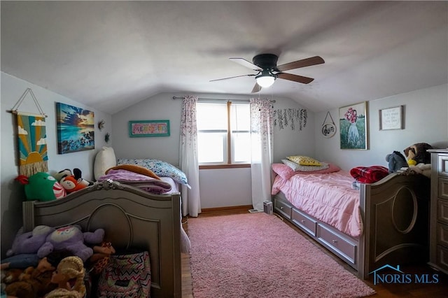 bedroom with ceiling fan and vaulted ceiling