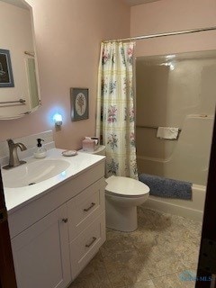 full bathroom with vanity, shower / bath combination with curtain, and toilet