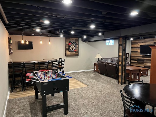 playroom featuring carpet floors and bar area