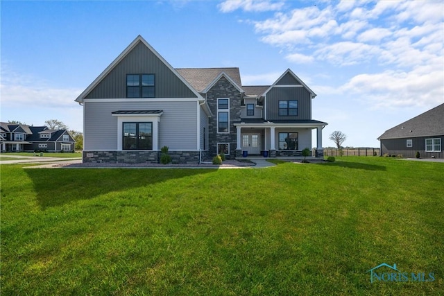 view of front of home featuring a front lawn