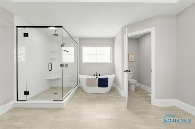 bathroom with toilet, separate shower and tub, and tile patterned flooring