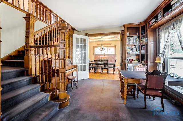 interior space featuring a chandelier