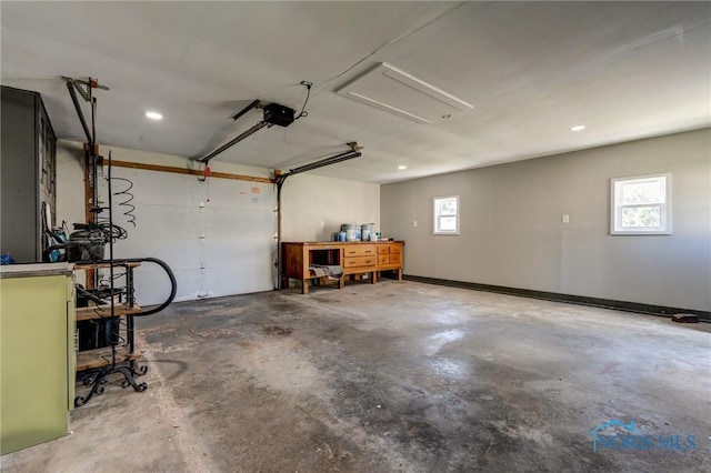 garage featuring a garage door opener