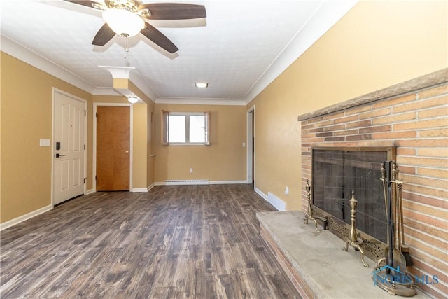 unfurnished living room with ornamental molding, dark wood-type flooring, and a fireplace