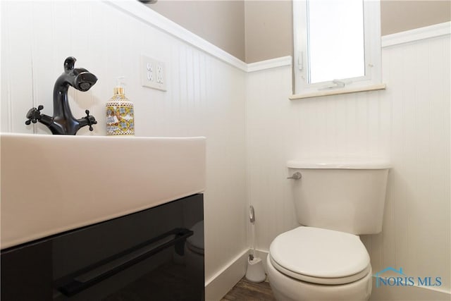 bathroom featuring toilet