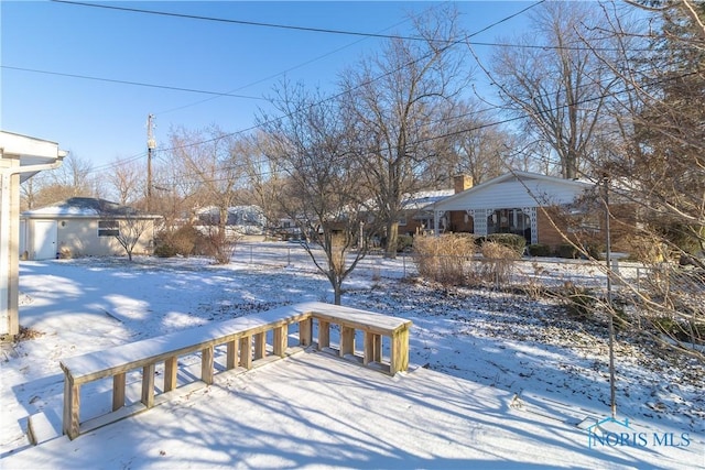 view of snowy yard