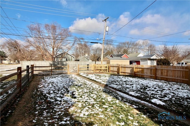 view of yard covered in snow