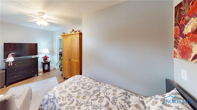 bedroom featuring ceiling fan and light wood-type flooring