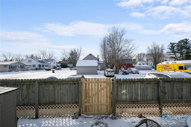 view of yard covered in snow