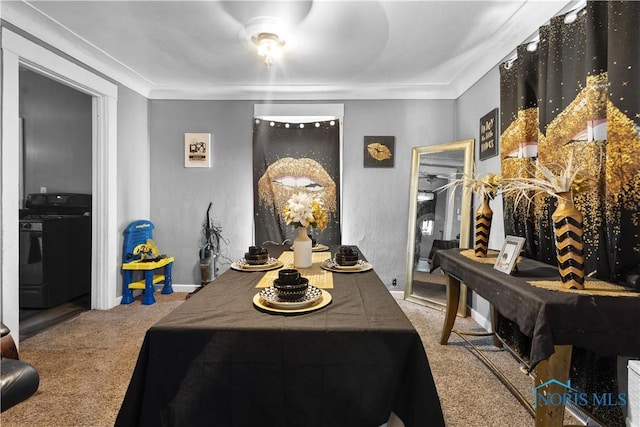 view of carpeted dining area