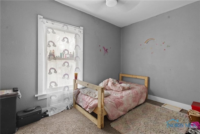 bedroom with carpet flooring and ceiling fan