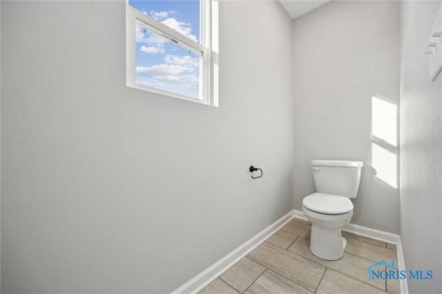 bathroom featuring toilet