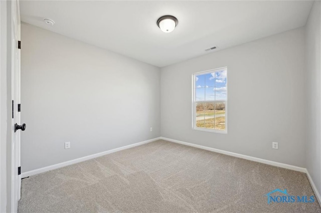 view of carpeted spare room