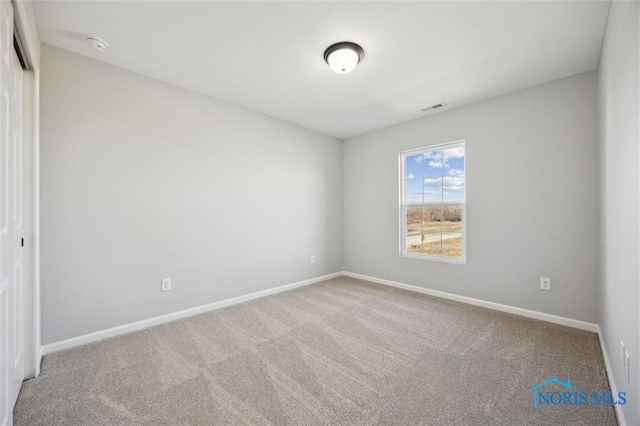 view of carpeted spare room