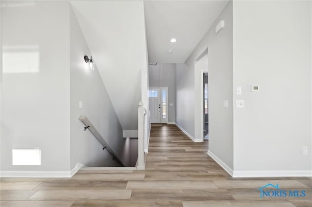 stairway featuring hardwood / wood-style flooring