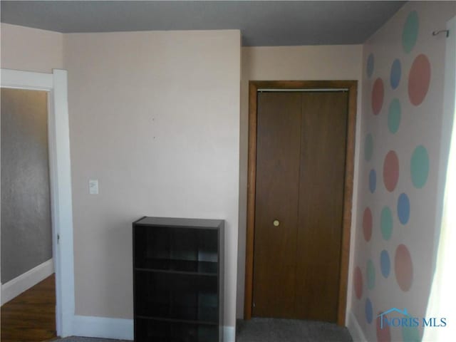 unfurnished bedroom with a closet