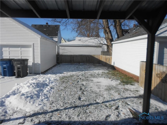 view of yard covered in snow