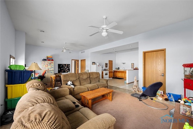 living room with ceiling fan