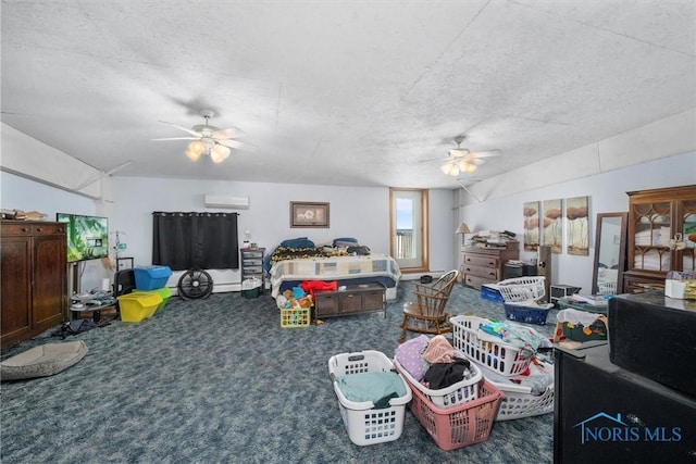 interior space with dark colored carpet, a wall unit AC, ceiling fan, and a textured ceiling