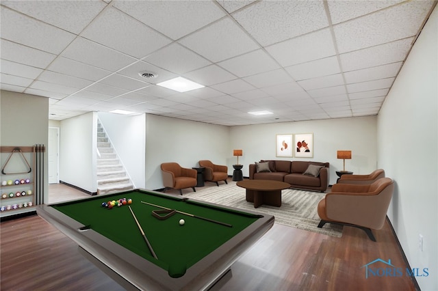 game room featuring a paneled ceiling, billiards, and hardwood / wood-style flooring