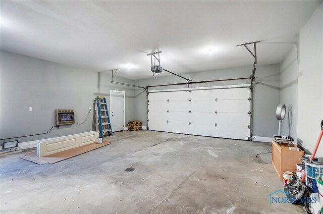 garage with heating unit and a garage door opener