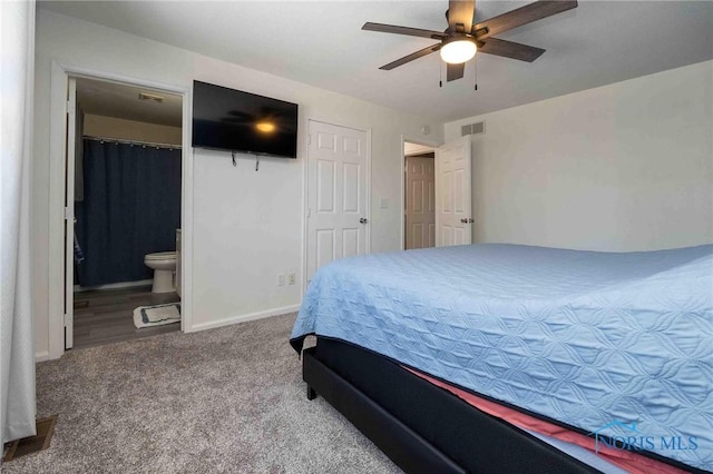 carpeted bedroom with ceiling fan and connected bathroom