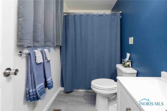 bathroom with toilet and vanity