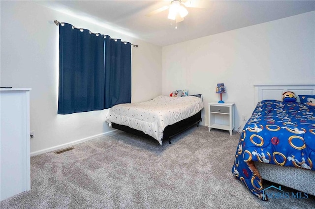 bedroom featuring ceiling fan and carpet floors