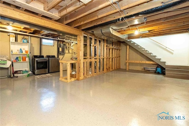 basement featuring washing machine and dryer